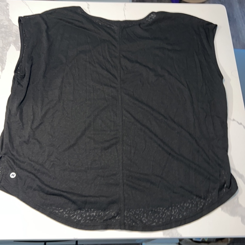 RBX- black T-shirt  with cheetah print back.